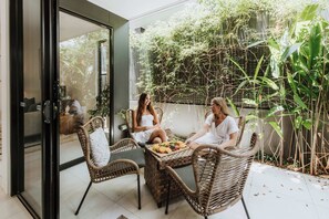 Grab your coffee or wine and enjoy this private shaded space