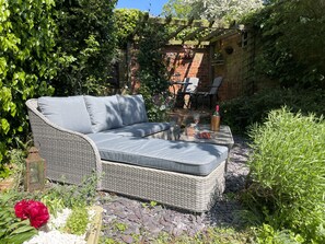 Relax on our sumptuous outdoor sofa