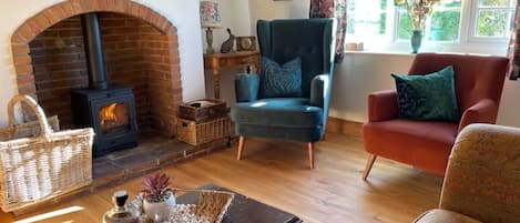 Cosy living room with log burner