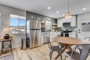 The kitchen has everything you need to cook up a storm, including a refrigerator/freezer, stove/oven, microwave, and dishwasher. Enjoy having all the cookware, dishes, and utensils you'll need.