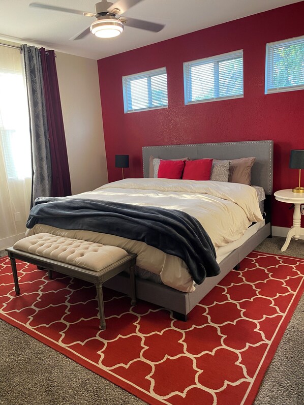 Plush king size bed, w/ 50 inch tv, and private bathroom