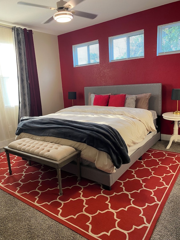 Plush king size bed, w/ 50 inch tv, and private bathroom