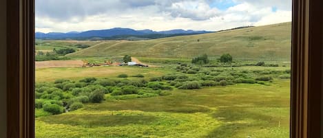 Summer view out the windows.Rocky Mountain National Park peaks in the back!