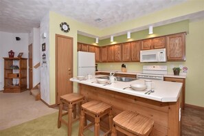 Indoors, Kitchen, Microwave, Oven, Refrigerator