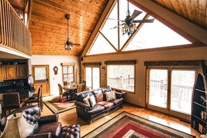 Lliving/dining on main floor. Expansive windows let in the light and the views!