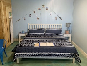comfy king sized bed in the Going Fishing Cabin at The Lazy Buffalo