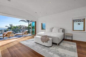 master bedroom upstairs with california king bed