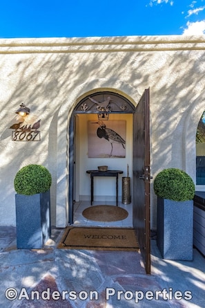 Front entrance to townhome through courtyard