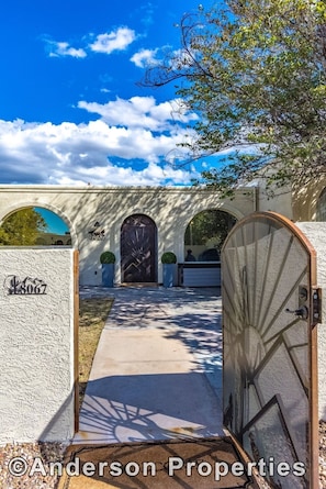 Locked gated entrance to courtyard