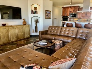 Large, comfy leather sectional with chaise.  