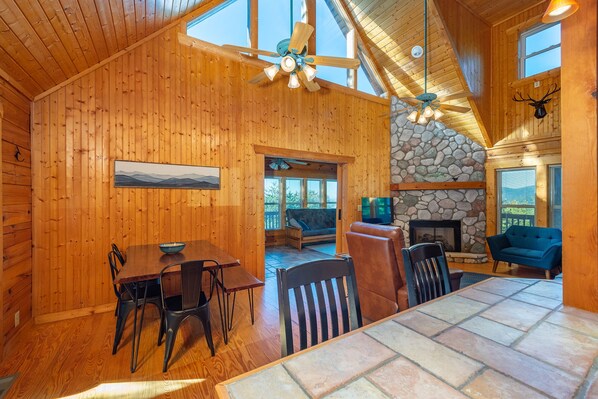 Open floor plan with living, dining, and kitchen areas.