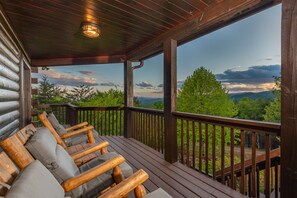 Relax on the wraparound porch as you look out at the stunning long-range mountain views.