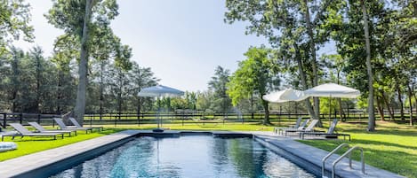 Pool overlooking horse farm