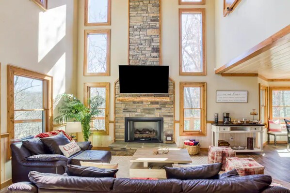 Relax an reconnect in our spacious family room with a 55" tv and cozy fireplace.