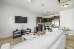 Homey living area with air conditioning and television