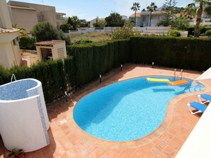 Water, Plant, Building, Azure, Swimming Pool, Tree, Chair, Outdoor Furniture, Sky, Leisure