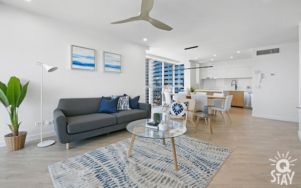The cozy living room and the dining area