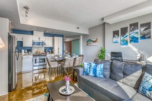 Modern Open-Concept Kitchen And Living Space, Perfect For Entertaining