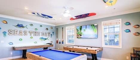 game room with shuffleboard, bowling, air hockey and pool