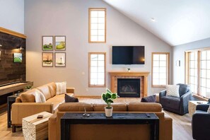 Main Floor Living Room - Beautiful vaulted ceilings and fire place