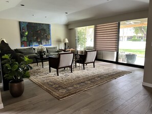 Living room w/ sliders to patio