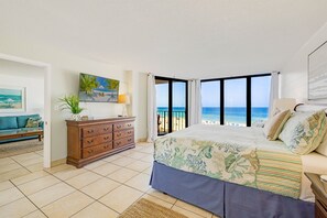 Beachfront primary with floor to ceiling view & King bed