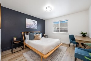 Natural light & upscale design with a designated work space in the main suite!