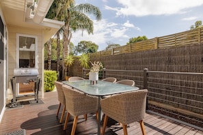 Outdoor deck area outdoor seating and BBQ