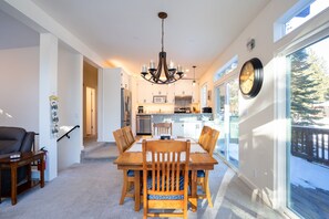 Enjoy a bright and airy open floor plan that seamlessly connects the living room, dining area, and kitchen—perfect for gathering and entertaining