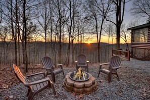 Gather around the firepit at this pet friendly North GA cabin rental