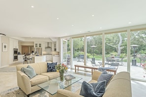 Light-Filled Living Room with Fireplace, Garden View