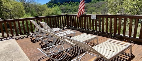 Trulove Lodge - Chaise lounge chairs on the deck to relax.