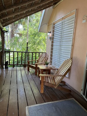 Chill on the front porch in or out of the screened-in section.