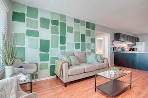 Fire & Cozy Living Room with Indoor Plants, Fireplace & Smart TV
Unwind in this modern yet cozy living room, designed for both comfort and style. Features a plush brown 3-seater sofa, 2 elegant accent chairs, and a sleek glass center table.