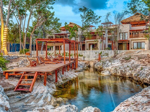 Take a dip or lounge cenote-side