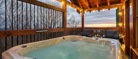 Relax in the hot tub upper level deck, accessible from a private doorway from each bedroom!