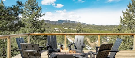 Take in the stars, make forever family memories, and enjoy this secluded view of the area with Mt. Evans in the background - one of Colorado's famous 14'ers.