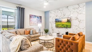 Cozy living space with modern decor, marble accents, and views