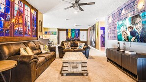Enchanting movie lounge with themed decor and cozy seating area