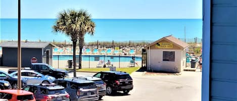 The view of the beach and pool from  the balcony, less then 100 yards from it.