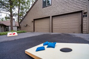 Bean bags flying, competition heating up, let the cornhole showdown begin!