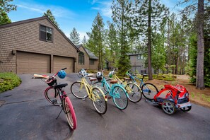 Bikes and helmets plus double kid trailer