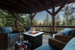 Lower deck. Warm-up by the fire and watch the mountain sunsets.