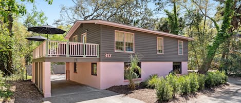 This home has ample parking and a spacious upstairs deck.