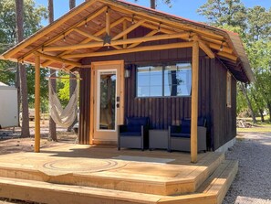 Lounge under the covered porch, hammock, deck chairs