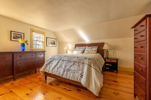 Second floor master bedroom has wide wood floors, AC, & solid cherry furniture. 