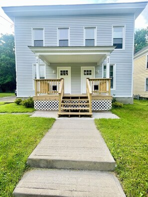 Front entrance of house. Separate door/entry way for each side.