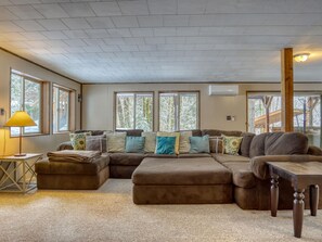 Living room with seating and vibrant accents