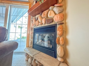 Curl up by the gas fireplace and enjoy a good book.