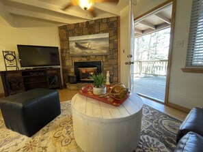 Furniture, Indoors, Living Room, Screen, Floor
